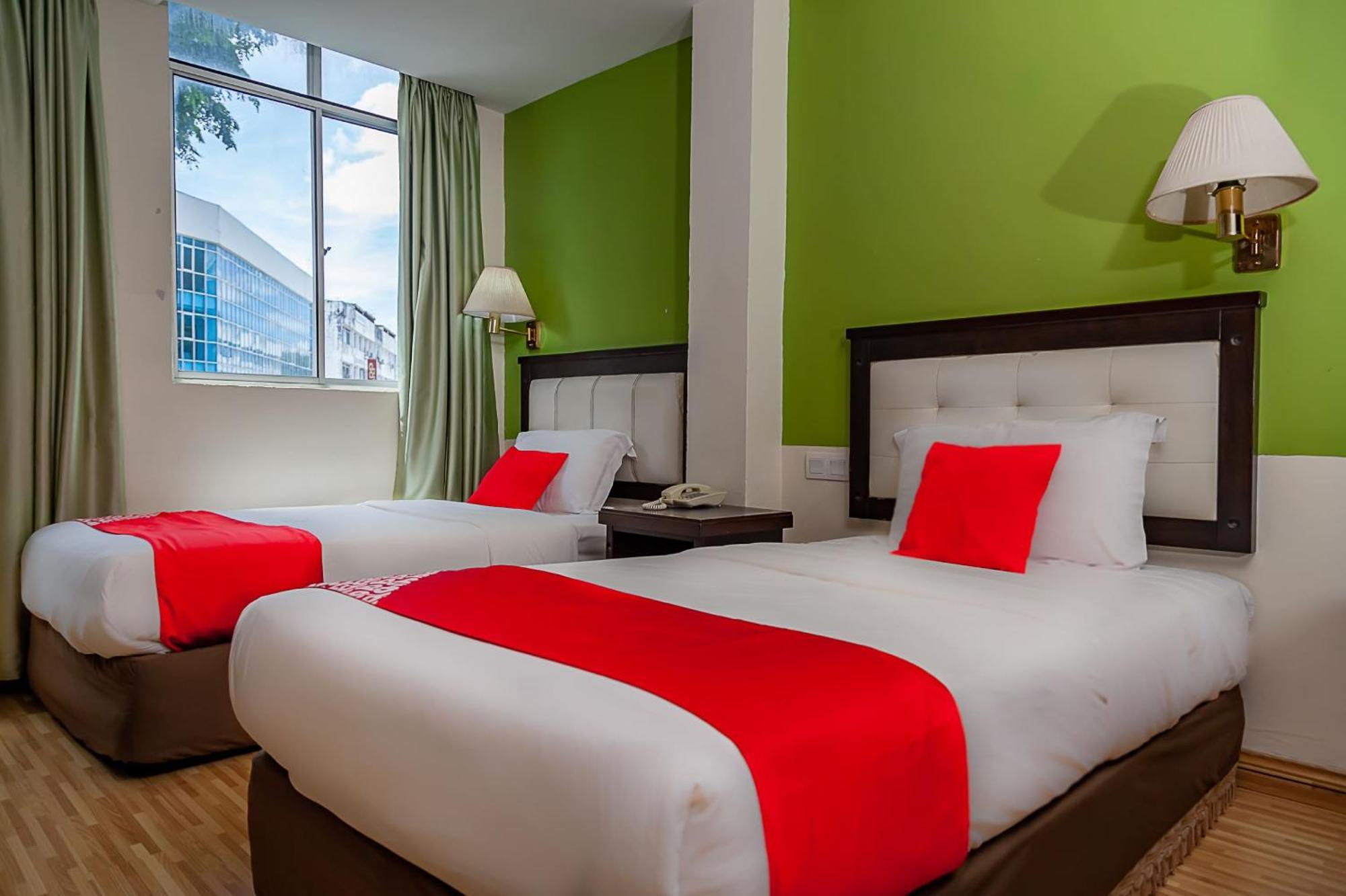 Super Oyo 90055 Mansion Inn Сибу Экстерьер фото